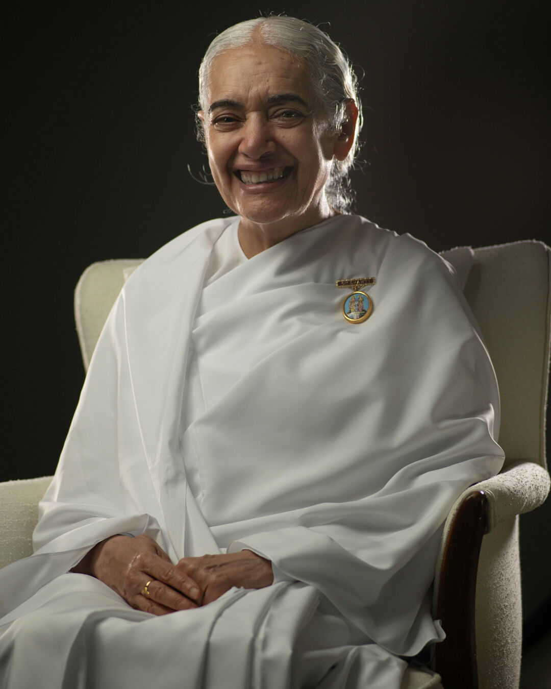 Sister Jayanti expressing 'Namaste'